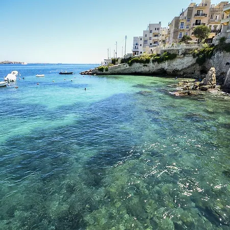 Seashells 2 Bedroom With Sunny Terrace With Stunning Sea Views - By Getawaysmalta Apartment