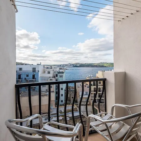 Seashells 2 Bedroom With Sunny Terrace With Stunning Sea Views - By Getawaysmalta