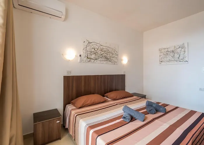 Seashells 2 Bedroom With Sunny Terrace With Stunning Sea Views - By Getawaysmalta